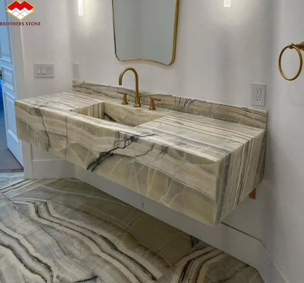 Painel de parede do banheiro do hotel e bacia de vaidade com lavatório feito de pedra natural mármore de ônix