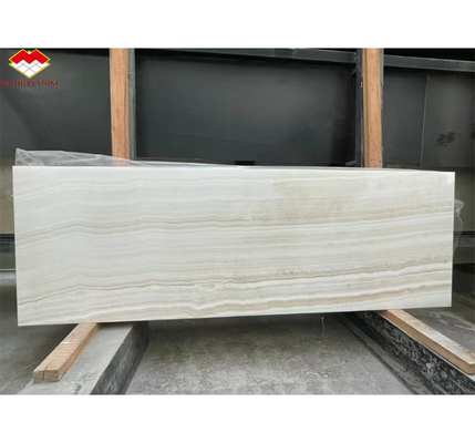 Painel de parede de banheiro de hotel de design moderno com luz de fundo de pedra natural branco mármore de ônix