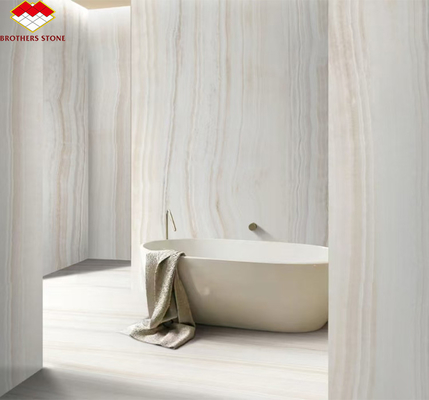 Painel de parede de banheiro de hotel de design moderno com luz de fundo de pedra natural branco mármore de ônix