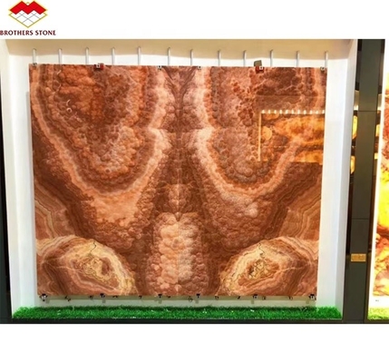 Livro de pedra de mármore de ónix vermelho iluminado por trás com placa combinada para padrão de mesa de mármore transparente