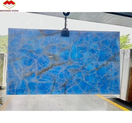 Placa de pedra de ônix azul natural translúcido para TV Painel de parede de fundo em azul dourado
