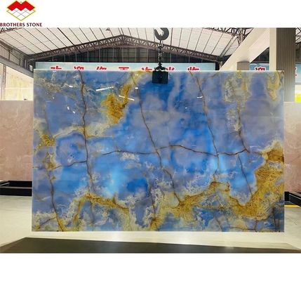 Placa de pedra de ônix azul natural translúcido para TV Painel de parede de fundo em azul dourado
