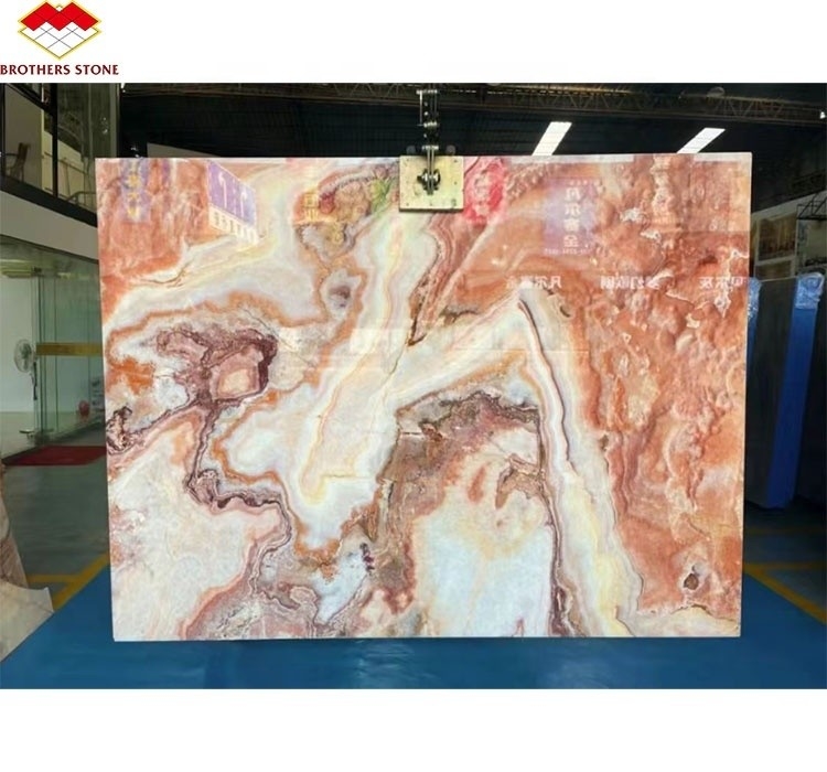 Livro de pedra de mármore de ónix vermelho iluminado por trás com placa combinada para padrão de mesa de mármore transparente